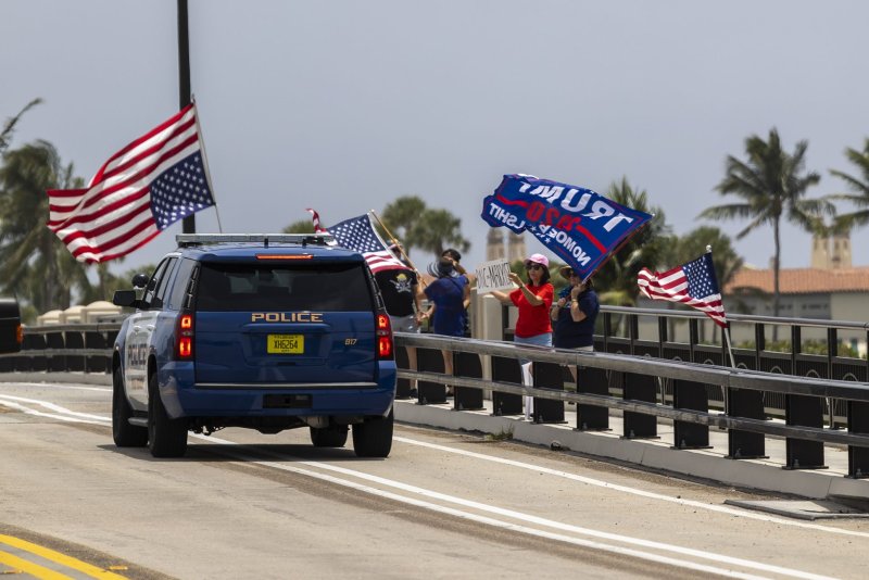 A group of supporters protest the FBI raid of Donald Trump's Mar-a-Lago residence in Palm Beach, Fla., on Tuesday. Photo By Gary I Rothstein/UPI