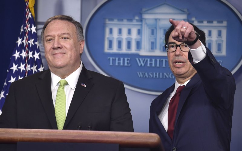 Treasury Secretary Steven Mnuchin (R) and Secretary of State Mike Pompeo sanctioned several companies on Wednesday over their connections to selling and shipping petrochemicals for Iran. Photo by Mike Theiler/UPI