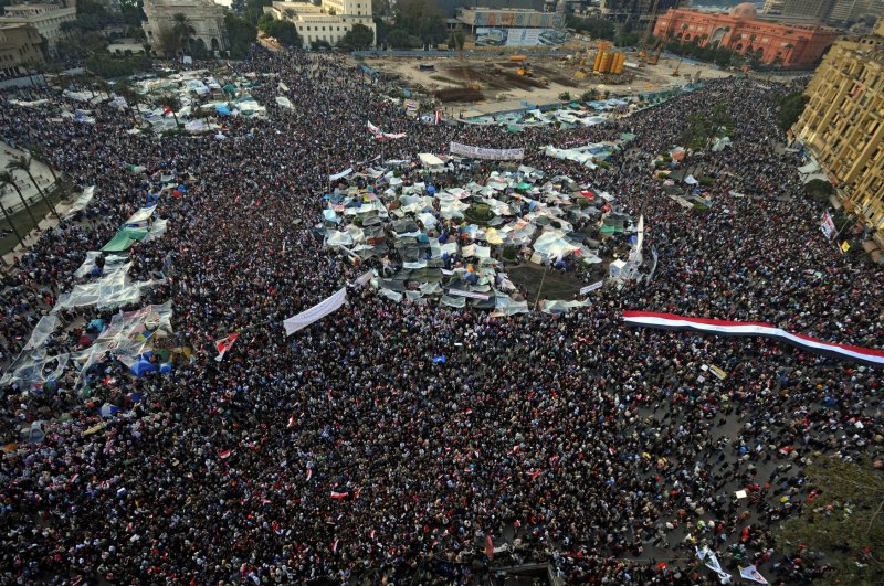Egyptian anti-government protesters gather in Cairo's Tahrir square in Egypt on February 8, 2011 as they display their national flag on the 15th day of protests against the regime of President Hosni Mubarak. UPI | <a href="/News_Photos/lp/20d674a9c07308dc6e0298fba0a1348b/" target="_blank">License Photo</a>