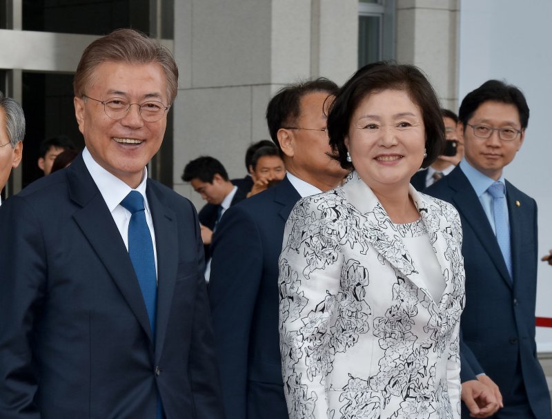 South Korean President Moon Jae-in (L), here with his wife, Kim Jeong-suk, after his May 10 inauguration, said Monday he proposed that the 2030 World Cup soccer tournament be held in northeast Asia, in several countries including North Korea. Photo by Keizo Mori/UPI