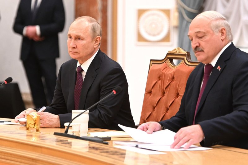 Belarusian President Alexander Lukashenko (R) and Russian President Vladimir Putin (L) appeared alongside one another in Minsk, Belarus, in December 2022. The two have agreed to station Russian tactical nuclear weapons in Belarus. Photo by Kremlin