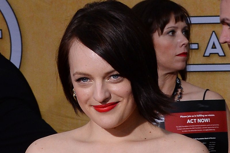 Actress Elisabeth Moss arrives for the 20th annual SAG Awards held at the Shrine Auditorium in Los Angeles on January 18, 2014. the Screen Actors Guild Awards are telecast live on TNT. UPI/Jim Ruymen | <a href="/News_Photos/lp/b1d9a3c57326464e18ddc86d2d97fa0a/" target="_blank">License Photo</a>