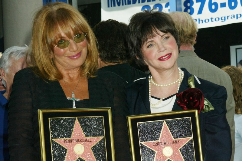 Cindy Williams (R), seen here with "Laverne and Shirley" co-star Penny Marshall in 2004, died on Jan. 25. File Photo by Francis Specker/UPI