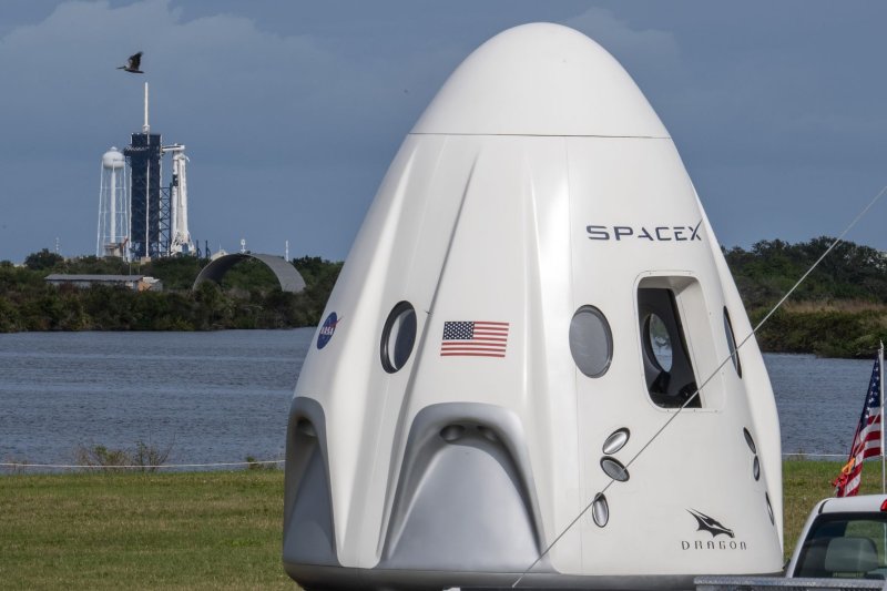 A model of the Crew Dragon spacecraft is shown at Kennedy Space Center in Florida in November. File Photo by Pat Benic/UPI