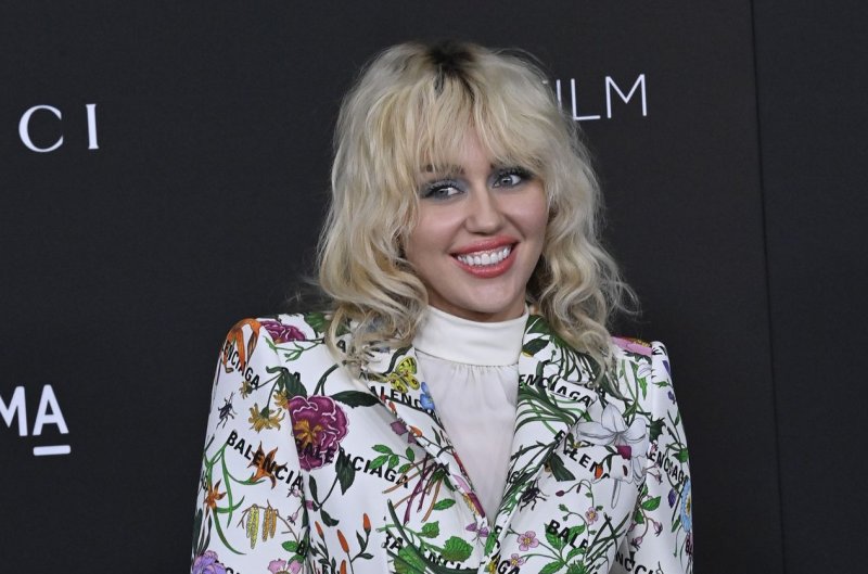 Miley Cyrus attends LACMA's Art+Film10th Annual gala in Los Angeles in 2021. She is hosting a New Year's Eve special with Dolly Parton live from Miami. File Photo by Jim Ruymen/UPI