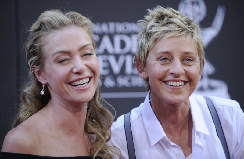 Ellen DeGeneres (R) and Portia de Rossi attend the 36th Annual Daytime Emmy Awards in Los Angeles on August 30, 2009. UPI/ Phil McCarten