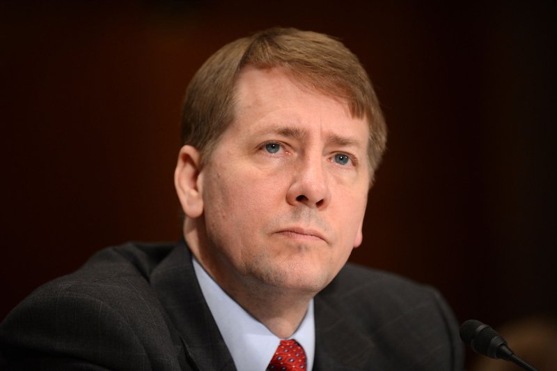 First chief of U.S. consumer watchdog agency to resign this month