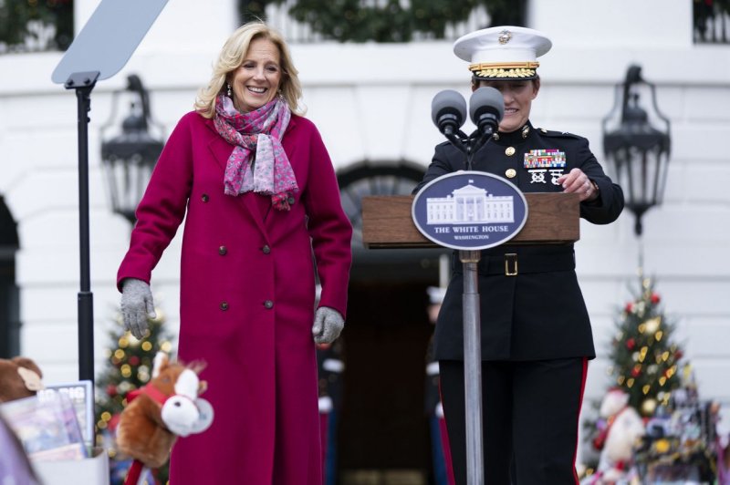 First lady Jill Biden and Brigadier General Valerie Jackson walk to the podium during Wednesday's Toys for Tots event for local Marine Corps and military-connected families at the White House in Washington, D.C. Photo by Bonnie Cash/UPI