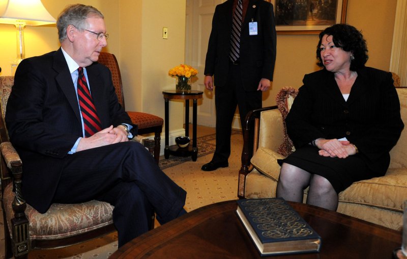 Judge Sonia Sotomayor (R), U.S. President Barack Obama's nominee to replace Supreme Court Justice David Souter, meets with Senate Minority Leader Mitch McConnell, R-KY, on Capitol Hill in Washington on June 2, 2009. (UPI Photo/Roger L. Wollenberg)