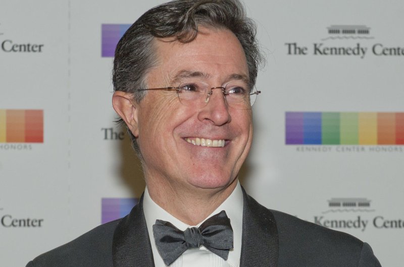 Stephen Colbert arrives for the formal Artist's Dinner honoring the recipients of the 38th Annual Kennedy Center Honors in Washington, D.C. on December 5, 2015. Colbert will host the 69th annual Emmy Awards ceremony in Los Angeles this September. Pool photo by Ron Sachs/UPI | <a href="/News_Photos/lp/5f6d96e94bf8499aa546b241102bfe73/" target="_blank">License Photo</a>