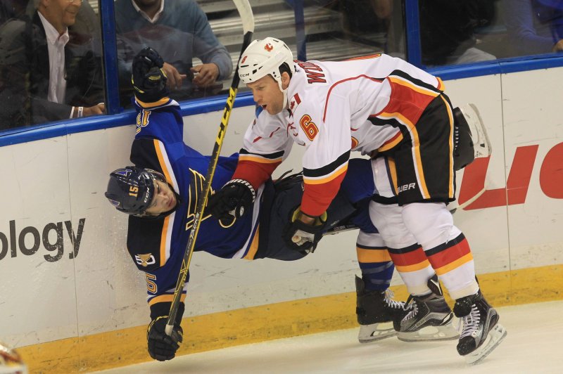 The NHL lost its appeal of a neutral arbitrator's ruling that Calgary Flames defenseman Dennis Wideman's (6) 20-game suspension for assaulted linesman Don Henderson in a Jan. 27, 2016, game be reduced to 10 games. File Photo by Bill Greenblatt/UPI