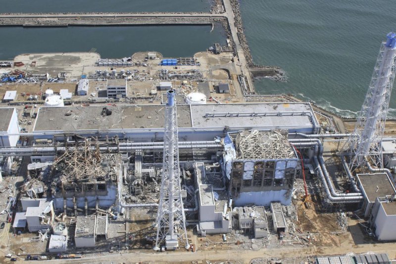 The crippled Fukushima Dai-ichi nuclear power plant in Okumamachi, Fukushima prefecture, northern Japan is seen in this March 24, 2011 aerial photo taken by small unmanned drone and released by AIR PHOTO SERVICE. UPI/Air Photo Service Co. Ltd.