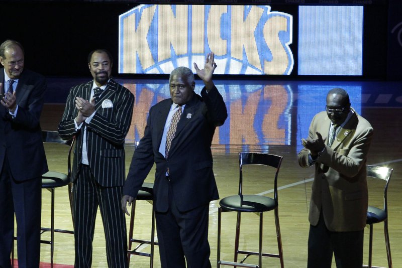 Former New York Knicks player Willis Reed reacts when he is introduced with the rest of the Knicks 1973 championship team at half time of the game against the Milwaukee Bucks at Madison Square Garden in New York City on April 5, 2013. File Photo by John Angelillo/UPI