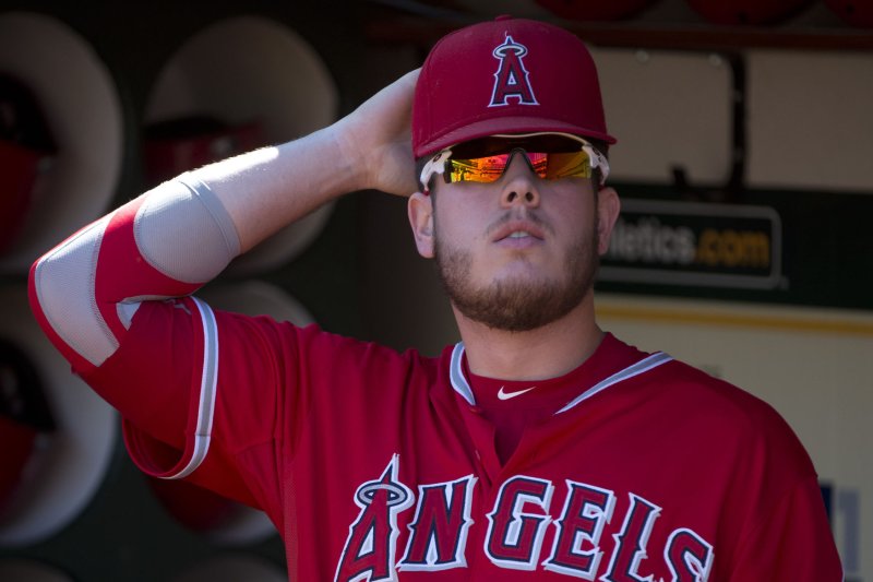 Los Angeles Angels' C.J. Cron waits in the dugout. File photo by Terry Schmitt/UPI