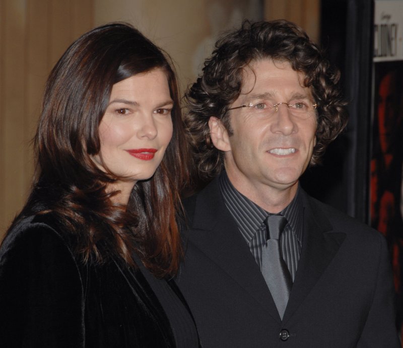 Actor Leland Orser (R), a cast member in the motion picture drama "The Good German", arrives with his wife, actress Jeanne Tripplehorn for the premiere of the film at the Egyptian Theatre in the Hollywood section of Los Angeles on December 4, 2006. The film directed by Steven Soderbergh is set in post-WWII Berlin. (UPI Photo/Jim Ruymen)