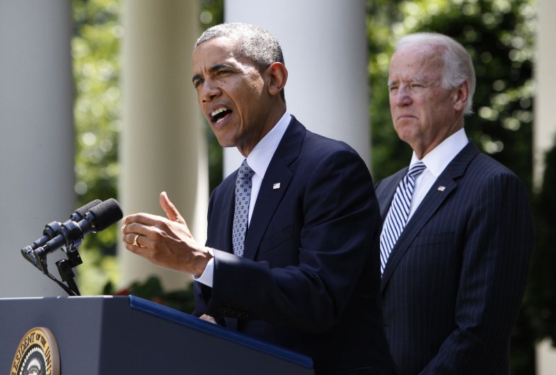 President Barack Obama, with Vice President Joseph Biden at his side, makes a statement on immigration reform in the Rose Garden of the White House on June 30, 2014. UPI/Dennis Brack/Pool