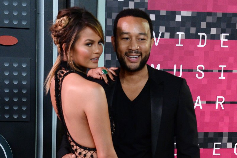 Model Chrissy Teigen and musician John Legend arrive for the 32nd annual MTV Video Music Awards in Los Angeles on Aug. 30, 2015. Photo by Jim Ruymen/UPI The couple announced Monday they are expecting their first child.