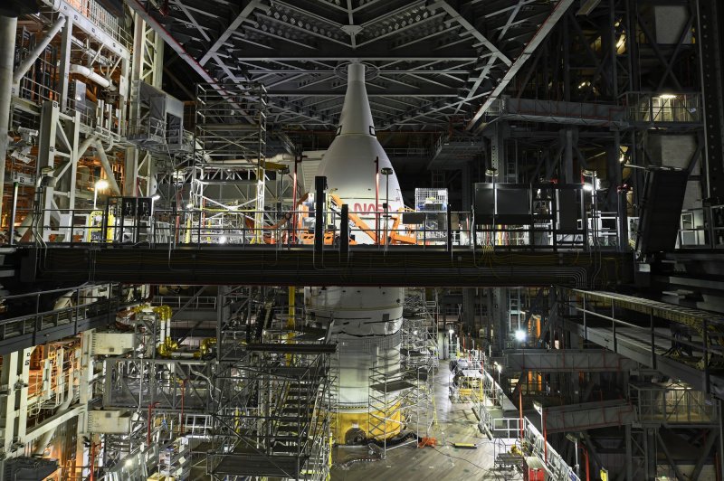 NASA's Orion spacecraft is shown stacked on top of the SLS rocket inside the Vehicle Assembly Building at Kennedy Space Center in Florida on Friday in preparation for a planned launch in early 2022 to the moon. Photo by Joe Marino/UPI