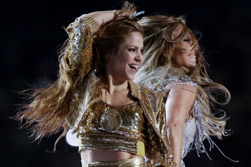 Shakira assembles robot Rauw Alejandro in 'Te Felicito' music video