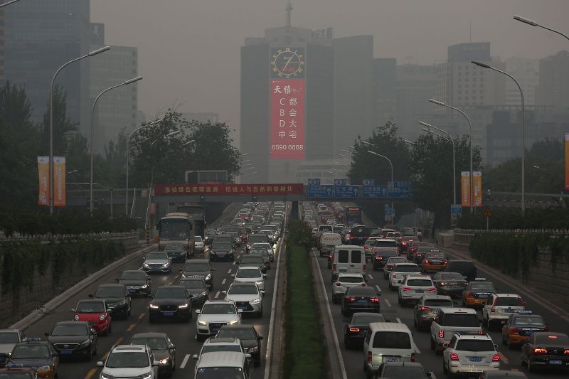 Beijing starts using special license plates for green vehicles
