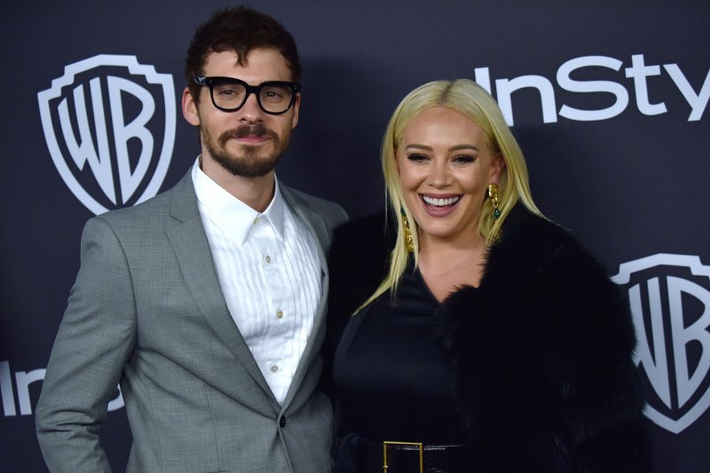 Hilary Duff (R), pictured with Matthew Koma, discussed her three kids and "How I Met Your Father" Season 2 on "Late Night with Seth Meyers." File Photo by Christine Chew/UPI