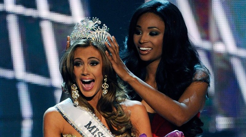 Miss Connecticut USA Erin Brady, left, reacts as she is being crowned 2013 Miss USA by the 2012 Miss USA Nana Meriwether during the 2013 Miss USA competition at the PH Live at Planet Hollywood Resort & Casino in Las Vegas, Nevada on June 16, 2013. UPI/David Becker | <a href="/News_Photos/lp/4cd594a997c0d971e391e2e69da840f9/" target="_blank">License Photo</a>