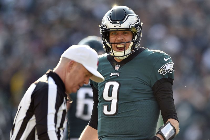 Philadelphia Eagles quarterback Nick Foles (9) argues a call with referee John Parry against the Houston Texans on Sunday at Lincoln Financial Field in Philadelphia. Photo by Derik Hamilton/UPI