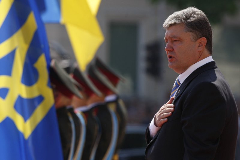 Ukrainian President Petro Poroshenko stands during the inauguration ceremony in Sophia Square in Kiev on June 7, 2014. UPI/Ivan Vakolenko | <a href="/News_Photos/lp/401c53d4ca76c78de7cc5629b7f4f0e0/" target="_blank">License Photo</a>