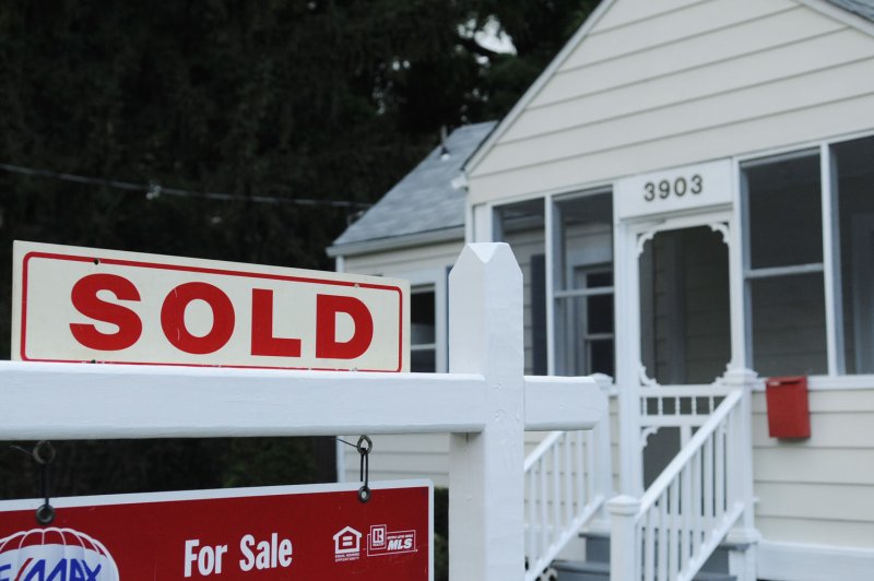 A sold sign outside a home for sale is seen in Arlington, Virginia on July 23, 2009. Freddie Mac said mortgages have jumped to their highest rate in nearly 15 years on Thursday. File Photo by Alexis C. Glenn/UPI