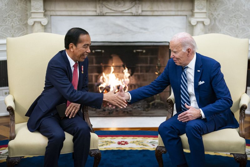 President Joe Biden shakes hands with Indonesian counterpart Joko Widodo in the Oval Office of the White House in Washington on Monday as the two announced a beefed-up strategic partnership. Photo by Al Drago/UPI