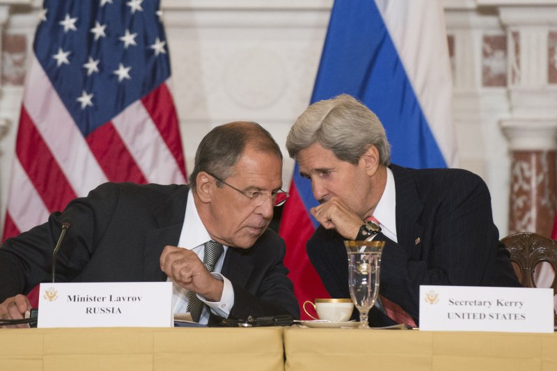U.S. Secretary of State John Kerry (right) talks to Russian Foreign Minister Sergey Lavrov during a meeting at the State Department on August 9, 2013 in Washington, D.C. (UPI/Kevin Dietsch)
