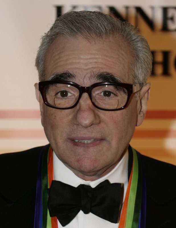 Film director Martin Scorsese (C) arrives with members of his family for the Kennedy Center Honors show in Washington on December 2, 2007. (UPI Photo/Yuri Gripas).