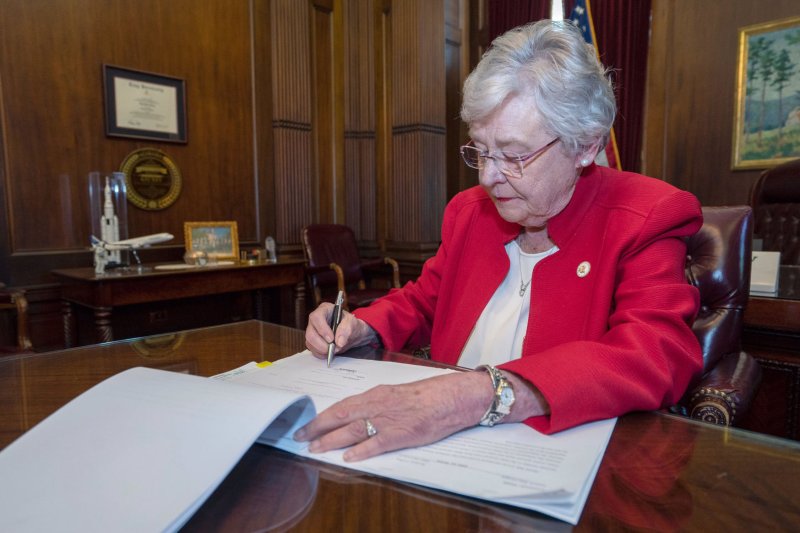 Alabama Gov. Kay Ivey is shown signing a law to restrict abortion on May 15, 2019. Ivey on Monday ordered state agencies to not enforce federal COVID-19 vaccine mandates. File Photo courtesy Alabama Governor's Office/UPI