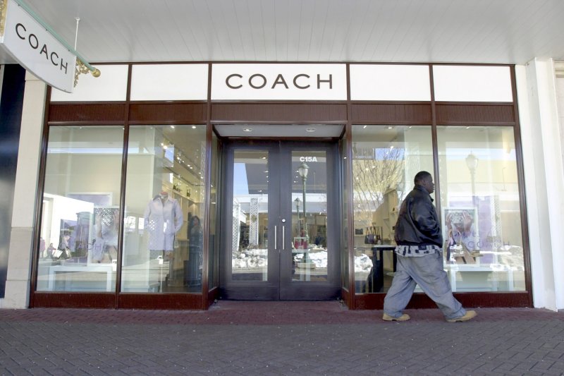 Luxury fashion house Capri Holdings, the owner of Jimmy Choo, Versace, and Michael has agreed to be taken over by U.S.-lifestyle brand Tapestry, the owner of Coach, in a cash deal announced Thursday that will see its investors receive $57 a share for a total of $8.5 billion. File Photo by Tannen Maury UPI