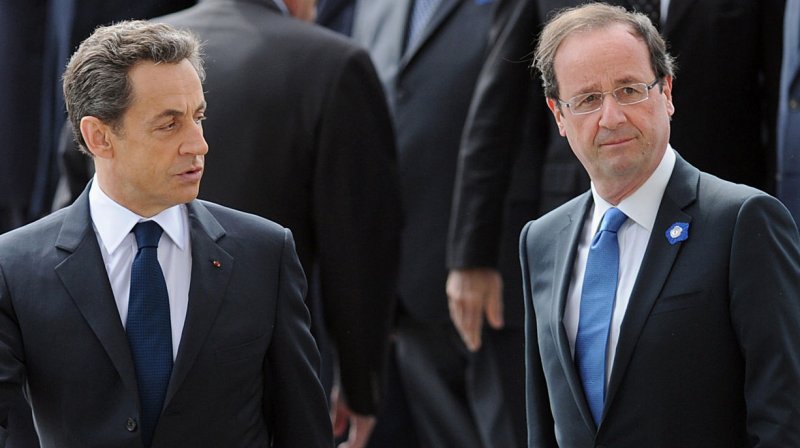 French President-elect Francois Hollande (R) and outgoing President Nicolas Sarkozy attend a ceremony marking the 67th anniversary of the Allied victory over Nazi Germany in World War II at the Arc de Triomphe in Paris, France, on May 8, 2012. Both laid a wreath at the Tomb of the Unknown Soldier. UPI/Pool | <a href="/News_Photos/lp/fd3a39c796602ccf70cdb174feba66a4/" target="_blank">License Photo</a>
