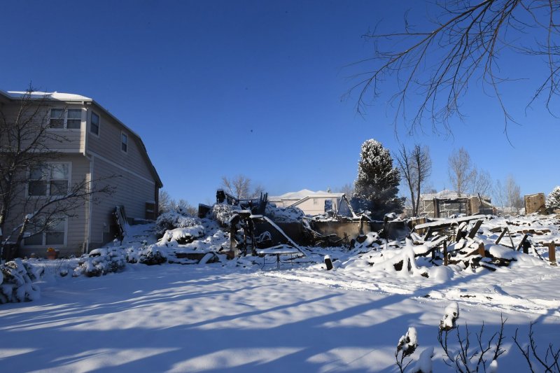 One house remains untouched as the others are destroyed in the aftermath of wildfires in Superior, Colo. Photo by Kate Grace/UPI | <a href="/News_Photos/lp/f820fb177331d5269f02bf3ea7fe8575/" target="_blank">License Photo</a>
