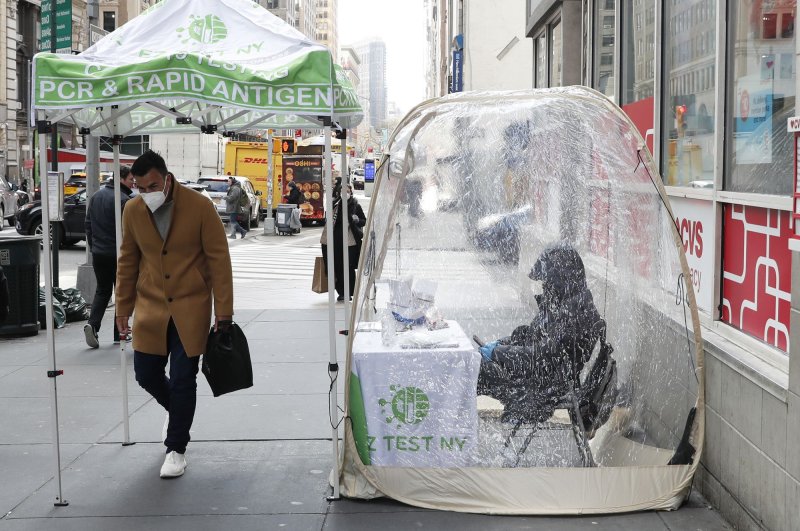 A COVID-19 testing site is set up on Fifth Avenue in New York City on January 18. File Photo by John Angelillo/UPI | <a href="/News_Photos/lp/40ff4661177f659168592e1ffcadba40/" target="_blank">License Photo</a>