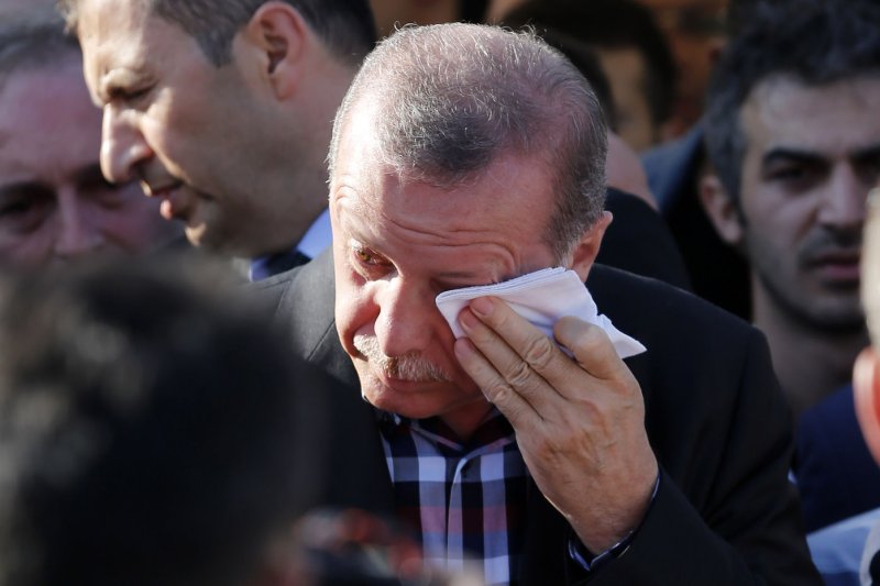 Turkish President Recep Tayyip Erdogan, seen here at a funeral of a victim of the coup attempt in Istanbul on July 17, 2016, said the United States must make a choice after failing to act on repeated requests to extradite U.S.-based Muslim cleric Fethullah Gulen. Photo by CemTurkel/ UPI