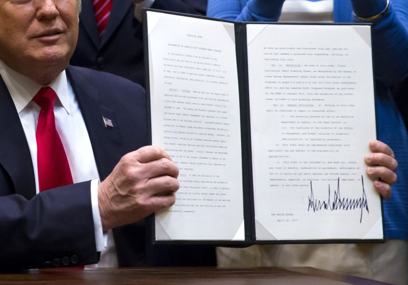 President Donald Trump signed an executive order on energy in the Roosevelt Room at The White House to expand off-shore drilling in April 2017. Nearly two years later, a federal judge has ruled that the executive order was illegal. File photo by Eric Thayer/UPI