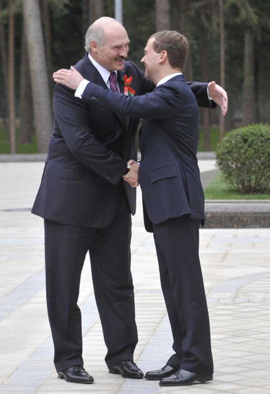Belarusian President Alexander Lukashenko (L) is greeted by Russian President Dmitry Medvedev before a meeting in Moscow May 8, 2010. (UPI Photo/Alex Volgin) | <a href="/News_Photos/lp/279d42e3eb2faa43dadbcb90d8345716/" target="_blank">License Photo</a>