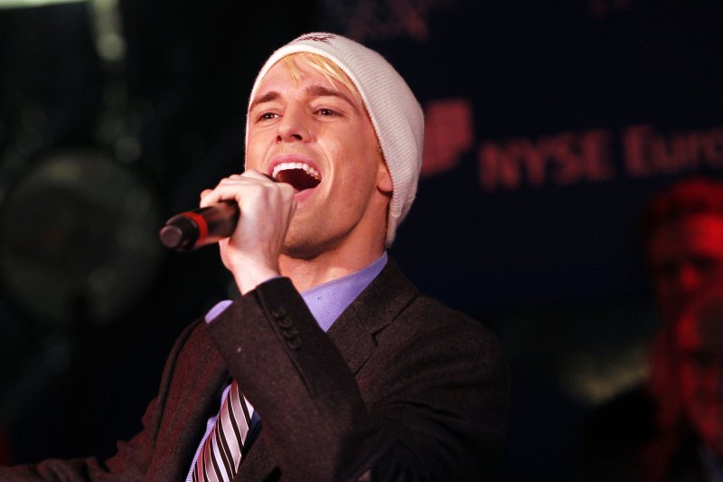 Aaron Carter of the Fantasticks Off-Broadway Show performs at the New York Stock Exchange on the day of the 88th Annual NYSE Christmas Tree Lighting on Wall Street In New York City on December 6, 2011. UPI/John Angelillo