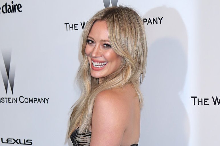 Hilary Duff posts with boyfriend Jason Walsh from bed