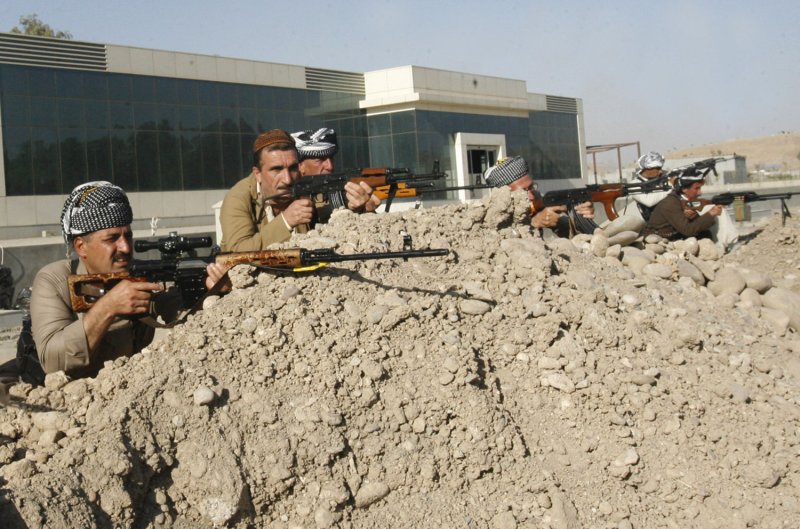 Kurdish Peshmerga troops take up positions near Mosul, Iraq, August 10, 2014. A spokesman for the U.S.-led coalition said 5,000 to 10,000 Islamic State combatants remain in the city, which is being bombed with airstrikes and ground attacks by the Iraqi army and the Pashmerga. File Photo by Mohammed al Jumail/UPI