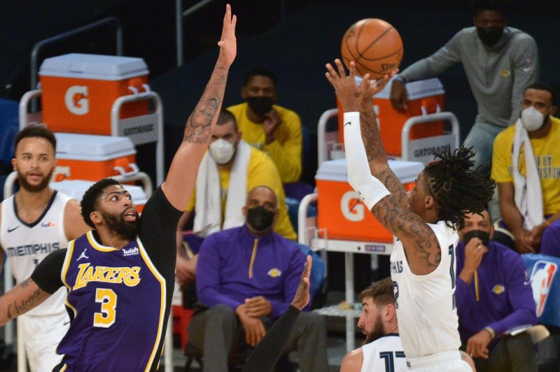 Memphis Grizzlies point guard Ja Morant (R) is indefinitely suspended. File Photo by Jim Ruymen/UPI