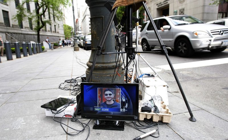 A picture of Pakistani-born U.S. citizen Faisal Shahzad is seen on a TV outside the United States Courthouse at 500 Pearl Street in New York City on May 4, 2010. UPI/John Angelillo