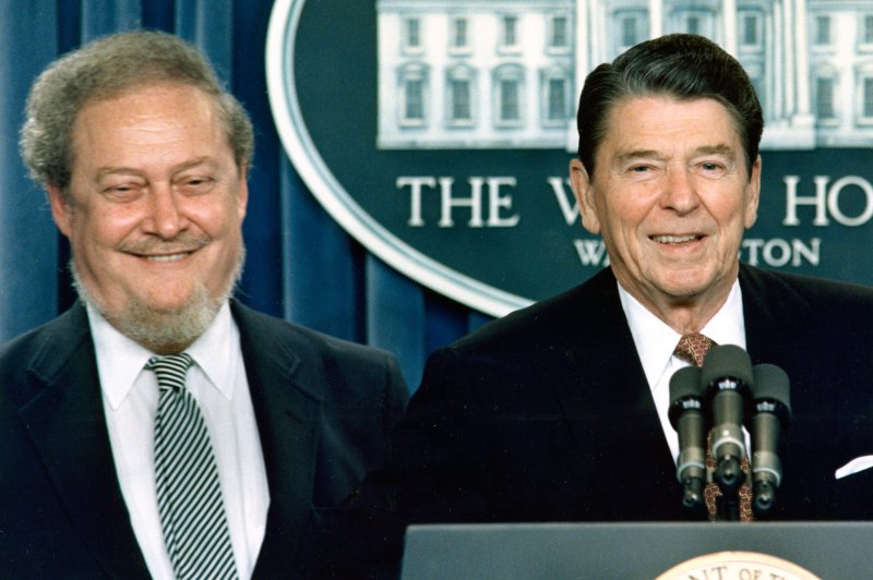 President Ronald Reagan (R) tells reporters on July 1, 1987, he is nominating Judge Robert Bork to fill the vacancy on the U.S. Supreme Court. On October 23, the U.S. Senate rejected President Ronald Reagan's nomination of Robert Bork to the Supreme Court by the biggest margin in history, 58-42. File Photo by Vince Mannino/UPI