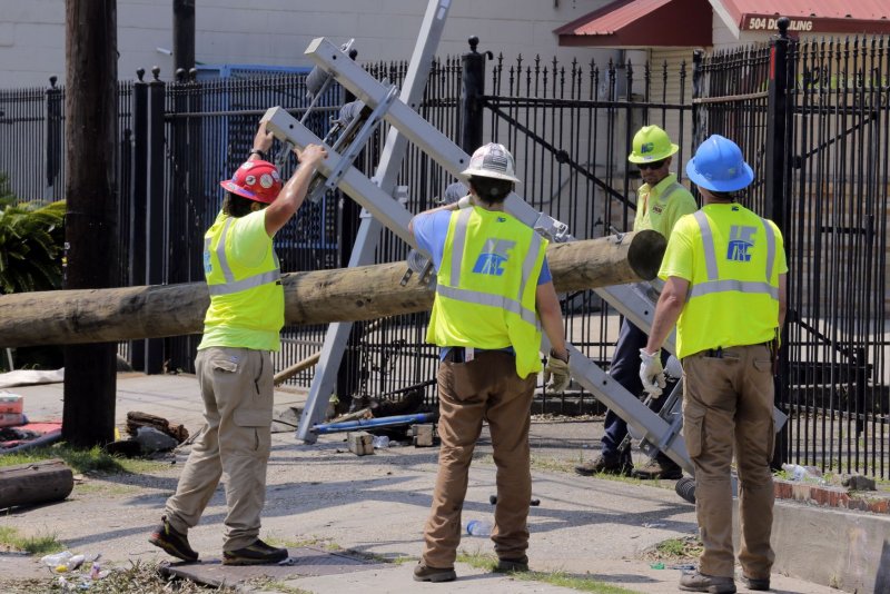 Power crews work to restore electricity in New Orleans on Thursday. The OMB Acting Director Shalanda Young said the White House will likely ask Congress for more funding for Hurricane Ida aid. Photo by AJ Sisco/UPI
