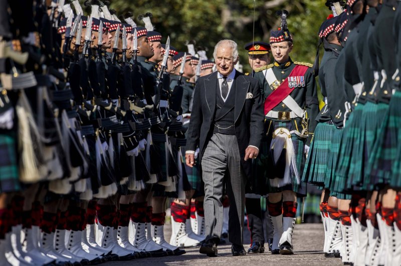Britain's King Charles III inspects an honor guard as he arrives at the Palace of Holyroodhouse, in Edinburgh, Scotland on Monday. Photo courtesy of UK Minister of Defense | <a href="/News_Photos/lp/52dad8697ce4f01a402e2bf434cd135f/" target="_blank">License Photo</a>