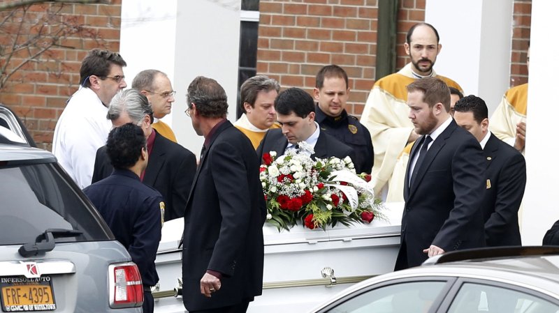 A casket containing the body of 6-year-old James Mattioli is departs Saint Rose of Lima Church near Sandy Hook Elementary School after the funeral in Newtown, Connecticut following a shooting four days before that left 26 people dead including 20 children on December 18, 2012. A gunman opened fire inside Sandy Hook Elementary School early Friday morning. The gunman 20-year-old Adam Lanza killed himself following the shooting rampage inside the school. UPI/John Angelillo | <a href="/News_Photos/lp/0ee53fb2e59465b114bfc63c633e0b05/" target="_blank">License Photo</a>