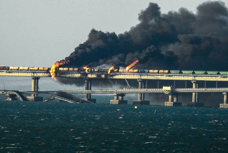 Black smoke billows from a fire on the Kerch bridge that links Crimea to Russia after a truck exploded on October 8. Photo by Vladimir Mordunov/UPI
